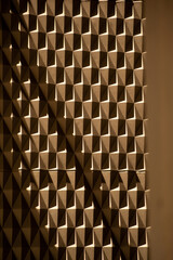 Photograph of a brown textured wall.