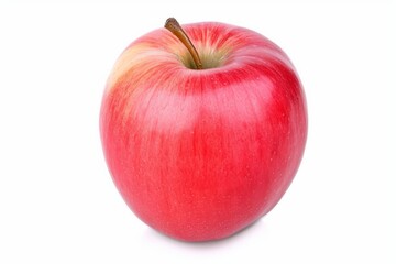 A red apple is displayed on a white surface, appearing vibrant and fresh.