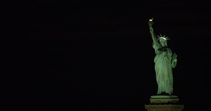 Statue of Liberty on its Pedestal with Black Night Sky
