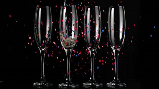 Animation of confetti falling over champagne glasses