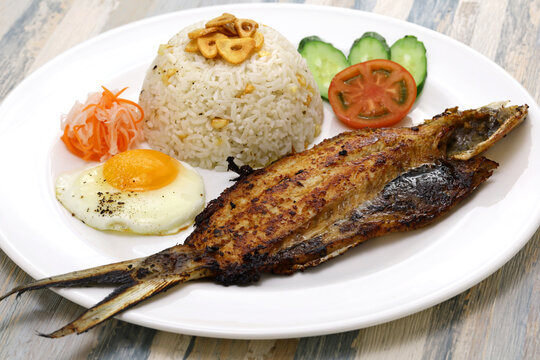 Bangsilog (milkfish, fried rice, and egg), traditional Filipino breakfast