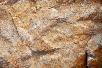 Stone texture background in tan, brown, and white