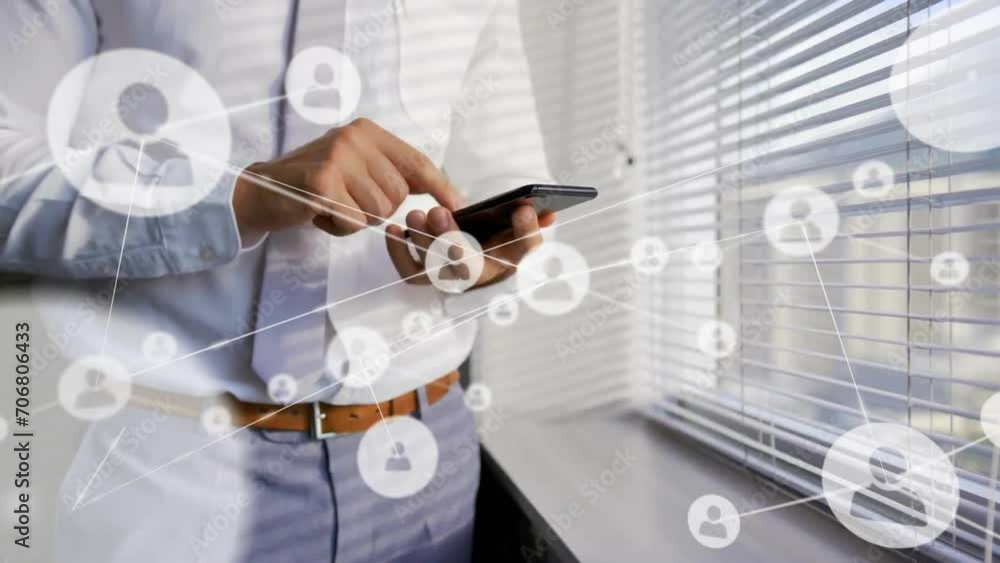 Poster animation of network of connections with icons over caucasian businessman using smartphone
