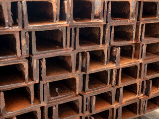 rusted U beam iron pile pattern