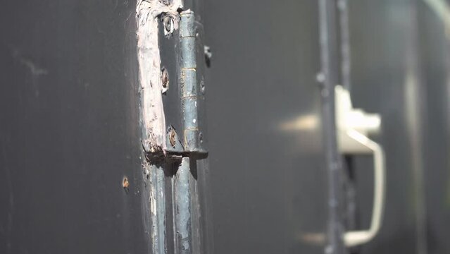 Hinges of an trailer door / View on door