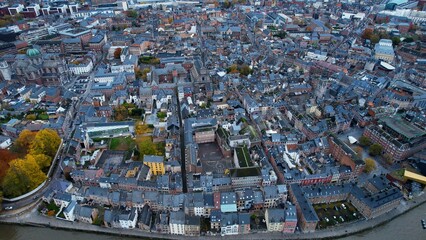 Aerial around the old town of Namur in Belgium on a cloudy afternoon in autumn	