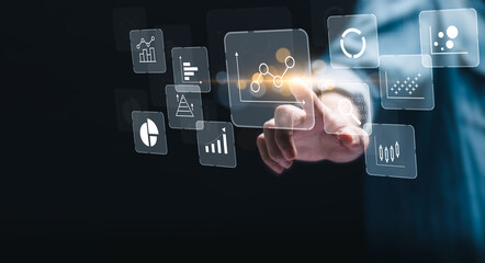 KPI Business analytics concept. Businessman touch virtual screen of data analytics report and key performance indicators on information dashboard for business strategy and business intelligence.