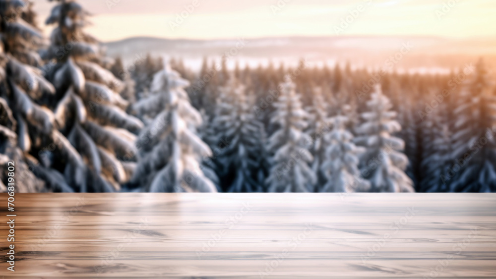 Poster empty wooden table against snowy landscape with fir trees in forest at sunset background