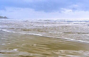 Long Beach on a misty winter day near Tofino, BC, Canada 