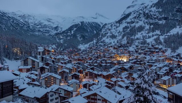 Sunset Timelapse of Zermatt Village from the matterhorn viewpoint overlooking the beautiful tranquil village