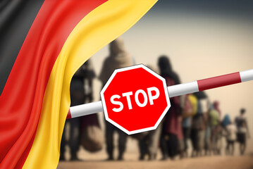 Migranten, deutsche Flagge und die Grenze zu Deutschland