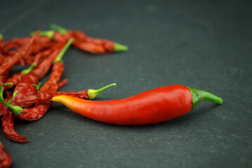 Fresh and dried whole red hot chili peppers