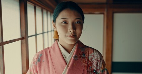 Japanese woman, portrait and kimono for ceremony in Chashitsu room with traditional fashion....