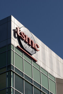 San Jose, CA, USA - May 3, 2022: TSMC logo is seen at its North America Headquarters in San Jose, California. Taiwan Semiconductor Manufacturing Company (TSMC) is a dedicated semiconductor foundry.