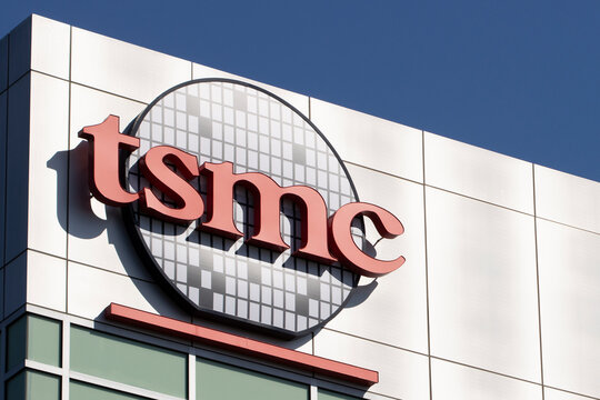San Jose, CA, USA - May 3, 2022: TSMC logo is seen at its North America Headquarters in San Jose, California. Taiwan Semiconductor Manufacturing Company (TSMC) is a dedicated semiconductor foundry.