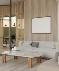 A beautiful modern living room with a comfortable couch, a blank picture frame on a wooden wall.