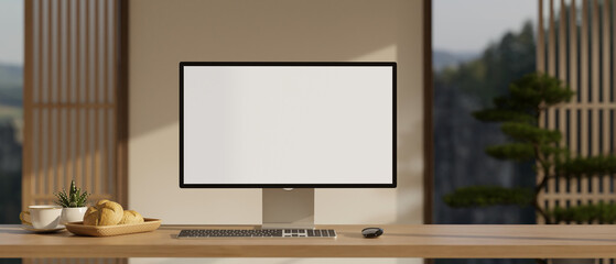 A modern home workspace with a white-screen PC computer mockup on a hardwood desk.