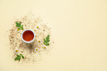 Composition with bowl of honey, fresh and dried chamomile flowers on color background