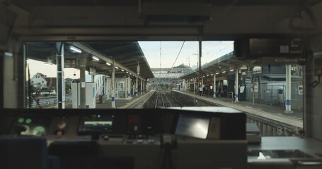 Train, window and travel with control panel, buttons or technology for transportation on track. Windscreen, machine and screen in locomotive by dashboard, railway infrastructure or journey in Tokyo
