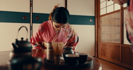 Woman in Japanese tea house with bow, kimono and relax with mindfulness, respect and gratitude....