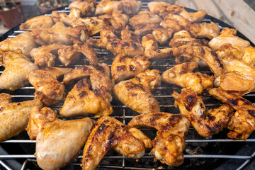 Chicken wings on the charcoal grill
