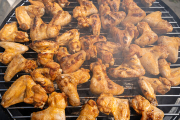 Chicken wings on the charcoal grill