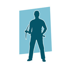 Silhouette of a man in worker costume carrying pick axe tool in action pose.