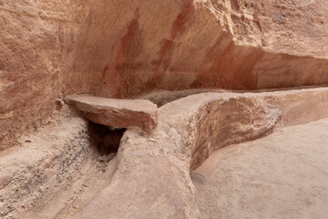 A drainage channel is cut into wall in continuation of entire gorge Al Siq in the Nabatean kingdom of Petra in Wadi Musa city in Jordan