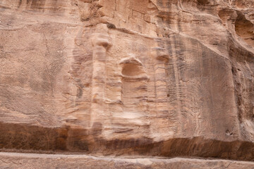 Pagan Nabatean altar carved into wall of the gorge Al Siq in the Nabatean kingdom of Petra in Wadi Musa city in Jordan