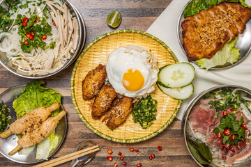 Chicken Wings with Fried Egg sunny side up and Rice, Vietnamese Sugar Cane with Shrimps, Grilled...