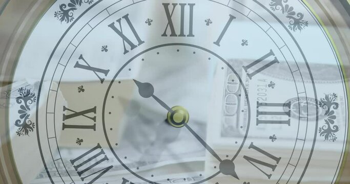 Animation of clock moving over banknotes