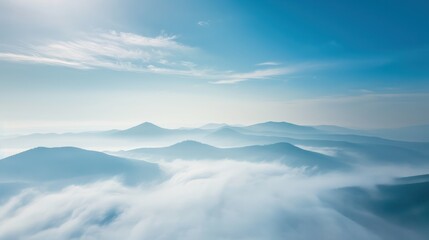 Mountain landscape with fog and blue sky background. Panoramic view.