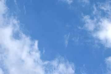 Light blue sky and white clouds. With copy space.	