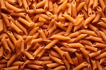 A full-frame shot of a raw Penne pasta background.