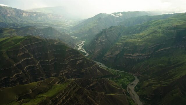 Serpentine River Through Mountain Valley