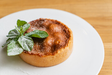 almond tart on the white plate
