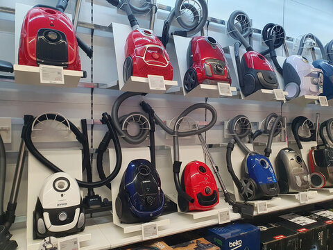 BUCHAREST, ROMANIA - JANUARY 03, 2024. Vacuum cleaners from different brands, like Samsung, Gorenje, Beko, Philips, Rowenta, in a store ready to be sold