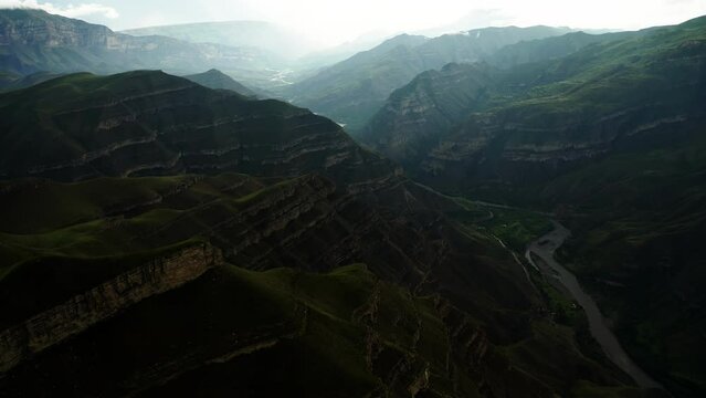 Verdant Cliffs Under Cloudy Skies.