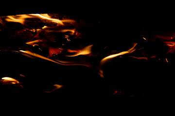 fire flashes on a black background.