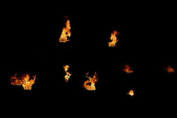 fire flashes on a black background.