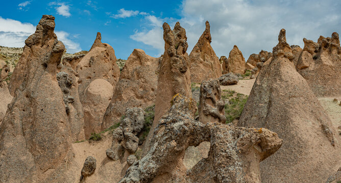 Rock formations in the form of bizarre forms created by nature in the Devrent Valley, Cappadocia