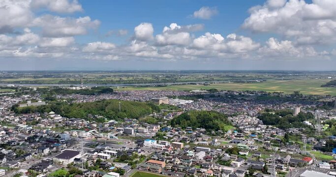 Aerial - Urban landscape of Japan Sakae-cho Inba-gun Chiba Sightseeing Business Dolly left