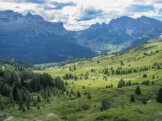 scenic view to the dolomites and the green landscape in the Alps