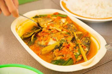 Woku cooking fish, traditional Sulawesi fish preparations with rich spices