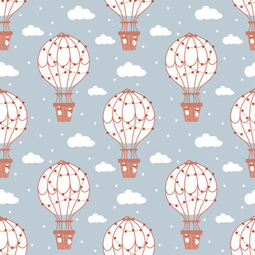 Seamless pattern with childish motifs. A flying balloon on a background of clouds and stars. Children's clothes, wallpaper, bed linen