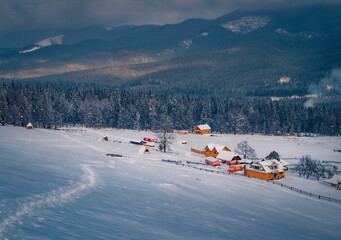 Beautiful winter scenery. Snowy morning scene of Carpathians village. Dramatic winter view of Kryvopillya village, Ukraine, Europe. Beauty of countryside concept background.