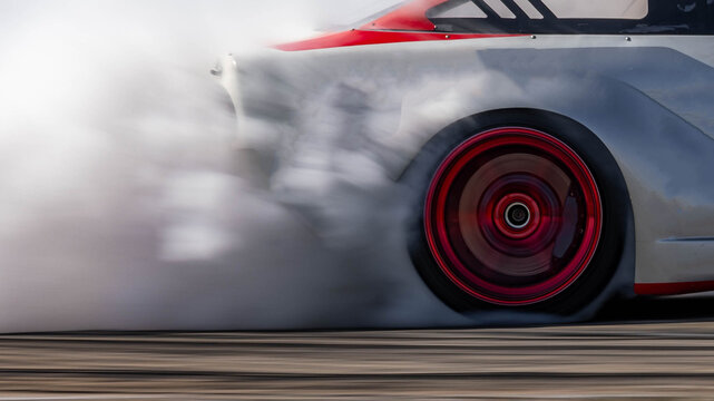 Blurred car drifting diffusion race drift car with lots of smoke from burning tires on speed track, Professional driver drifting car on race track with smoke.