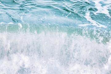 Wave splashing close-up. Crystal clear sea water, in the ocean in San Francisco Bay, blue water,...