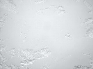 White flour texture background. Abstract powder texture. White powder surface with cracks.