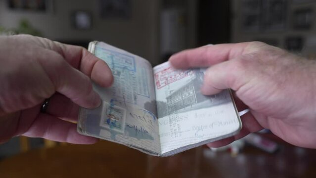 A passport full of stamps and visas after a lifetime of travel - close up
